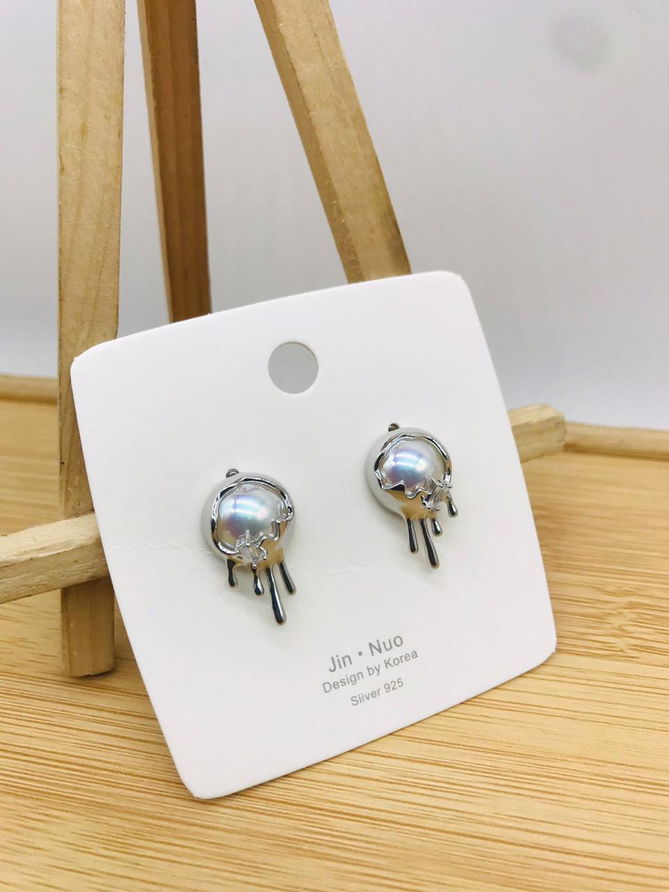 AD Diamond Steel And Rose Gold Party Wear Earrings 42
